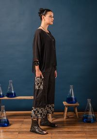 black pants with embroidered spot detail 100% made in australia